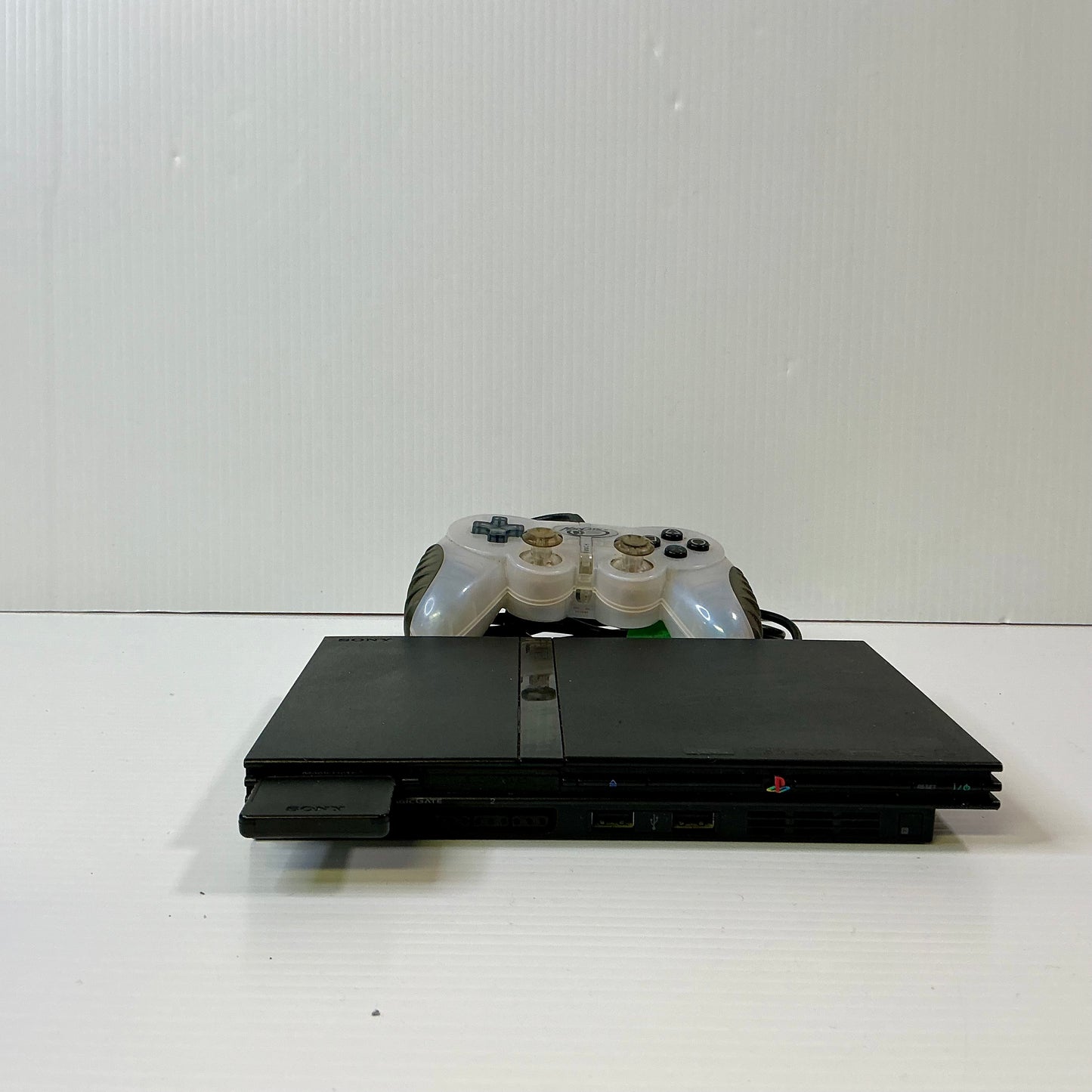 Play Station 2 Slim w/ Remote
