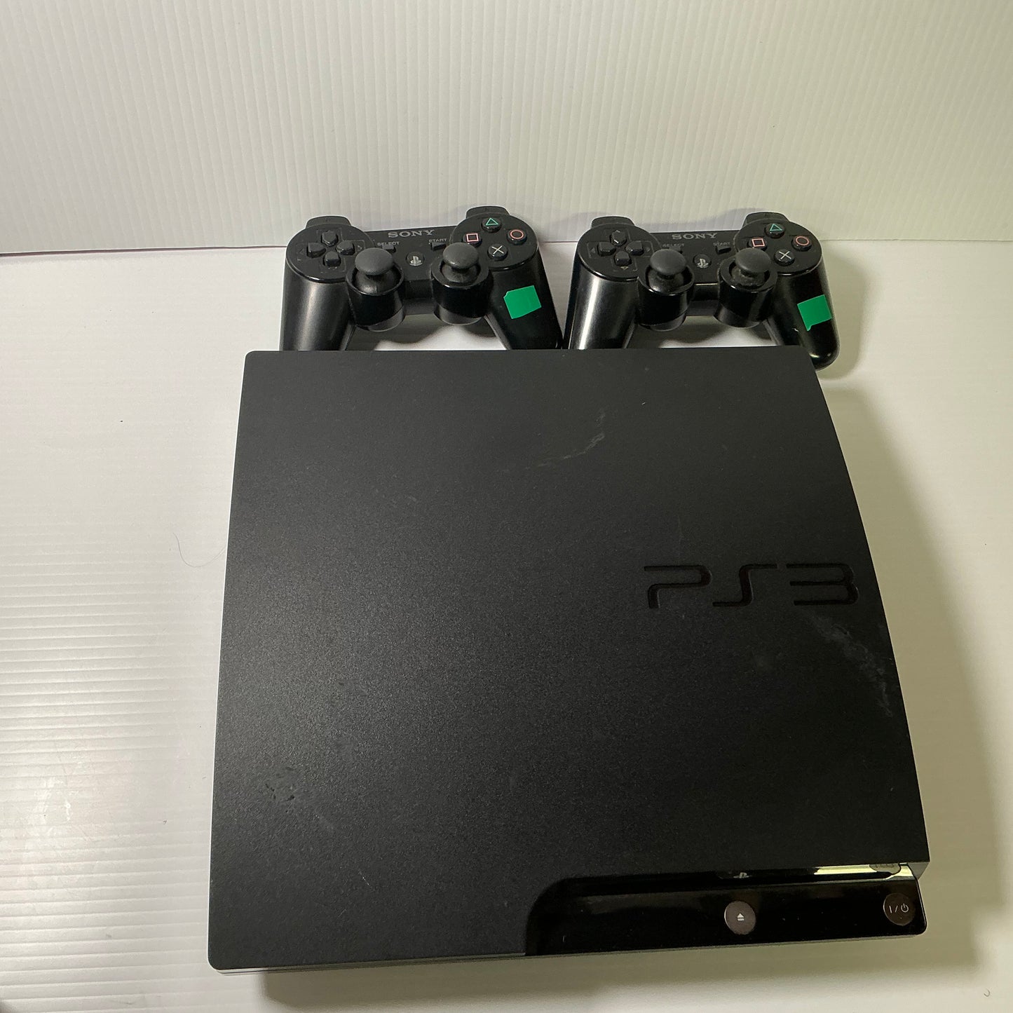 Playstation 3 Slim + 2 Controllers