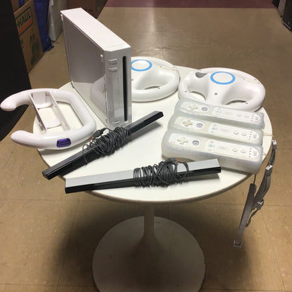 Nintendo Wii + 3 remotes & More