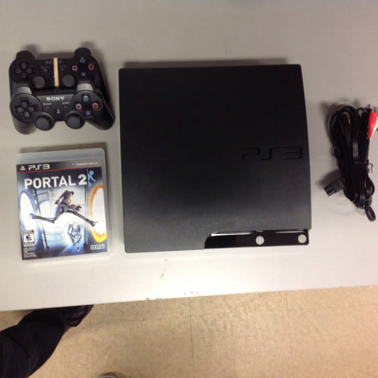 PlayStation 3 Slim w/ 2 Controllers + Games